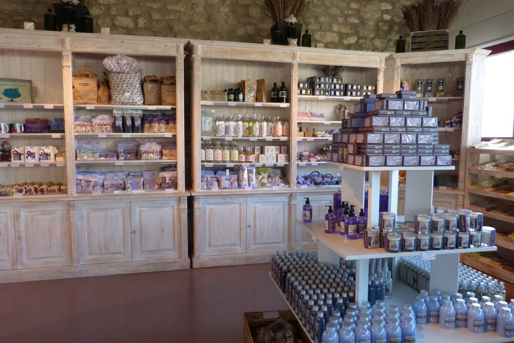 The estate shop at Les Agnels, its shelves of lavender oils, soaps and waters