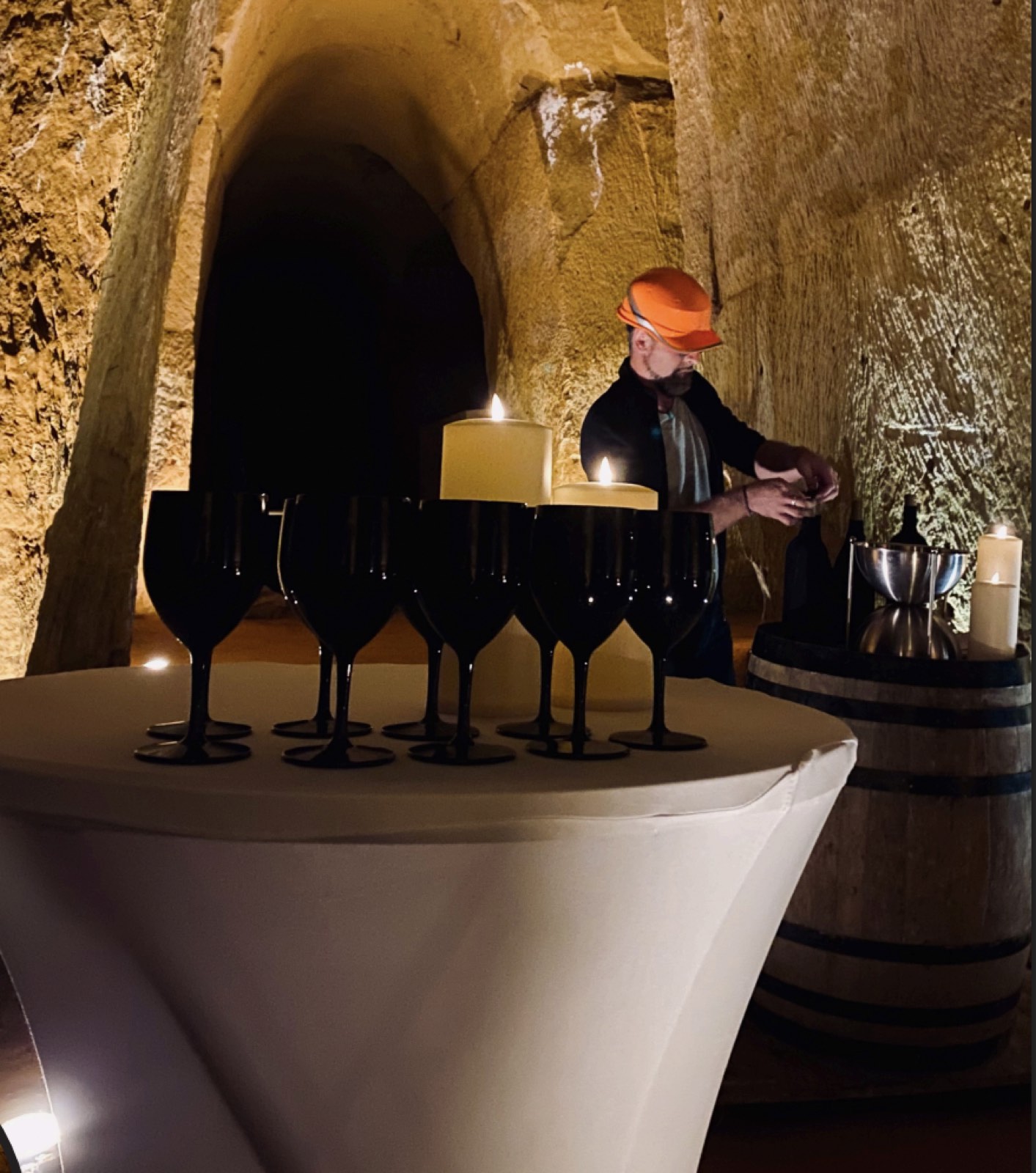 Blind wine tasting staged inside the ochre galleries of Mines de Bruoux