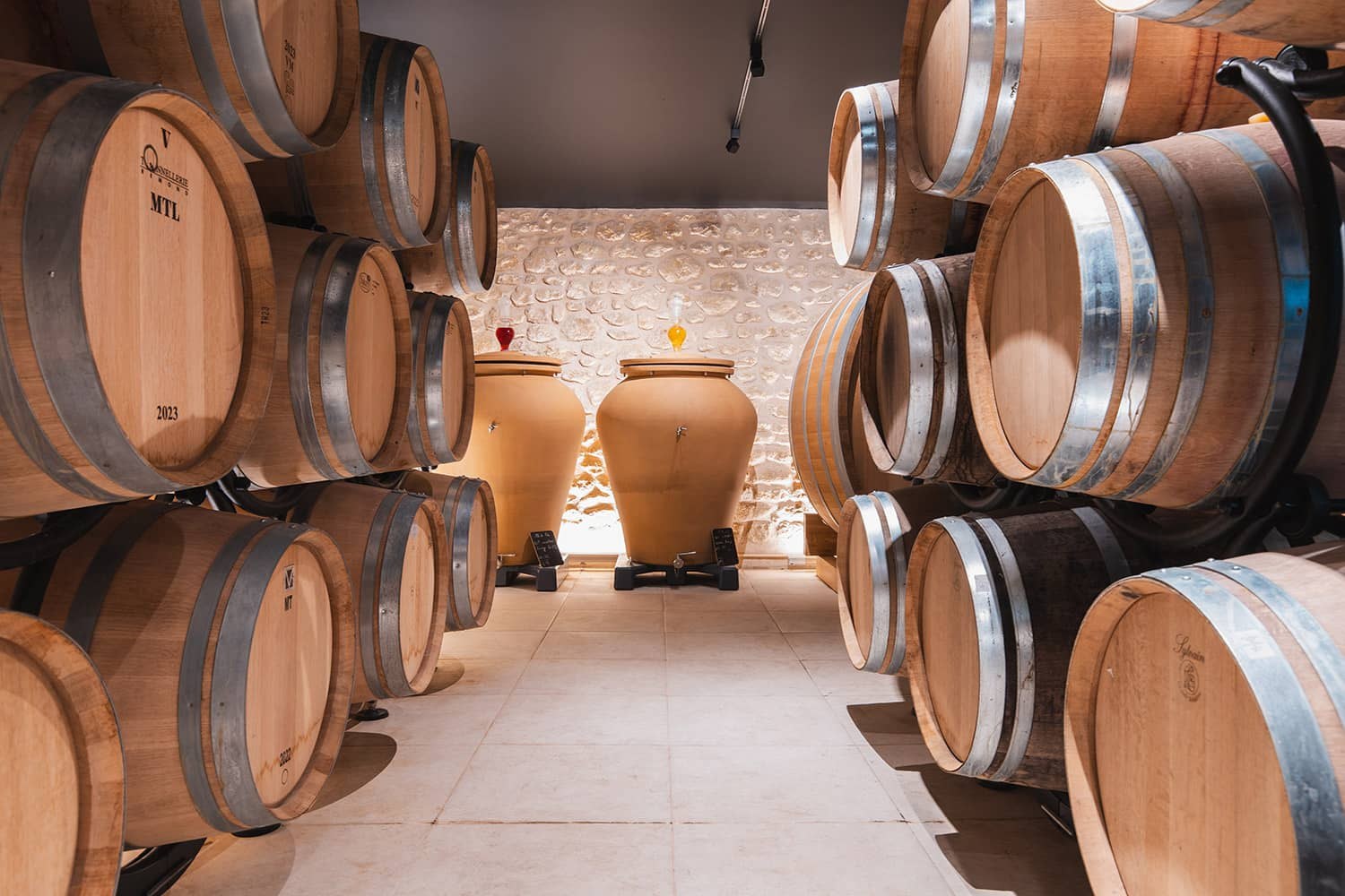 The Grand Chai set for dinner, barrels above the stone arches