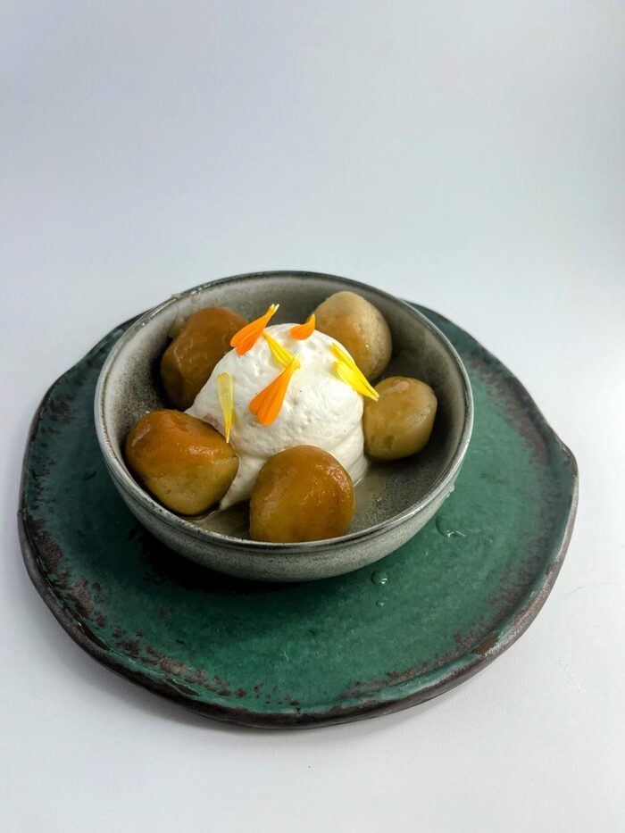 Baba bouchons soaked in La Douce de Forcalquier liqueur, served with chantilly