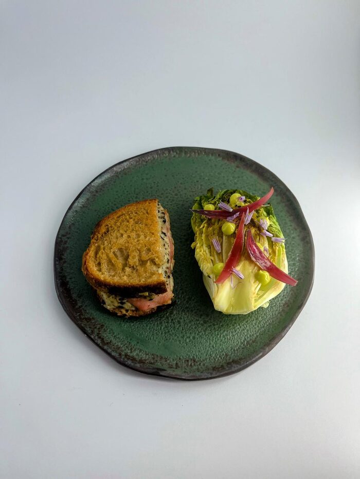 Truffle croque with grilled sucrine lettuce and onion pickles