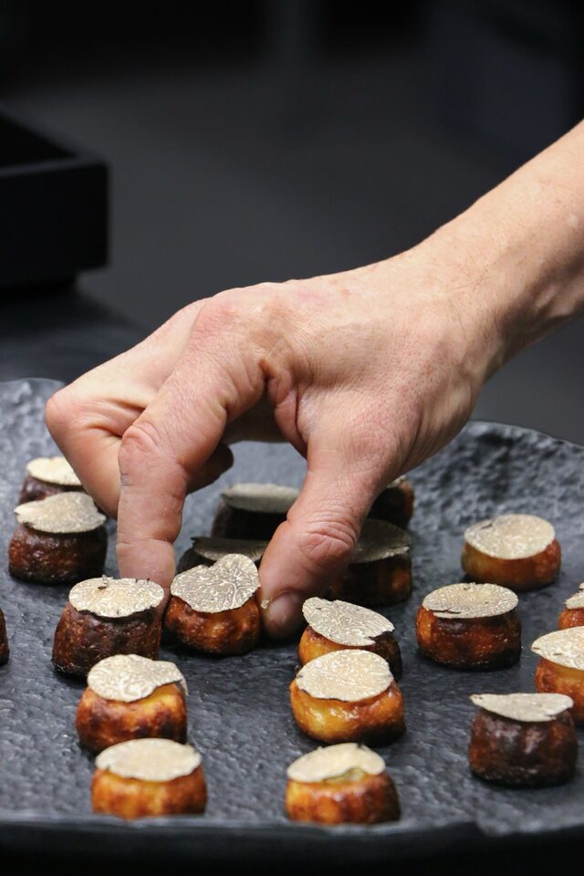 Truffle shaved by hand over the plate