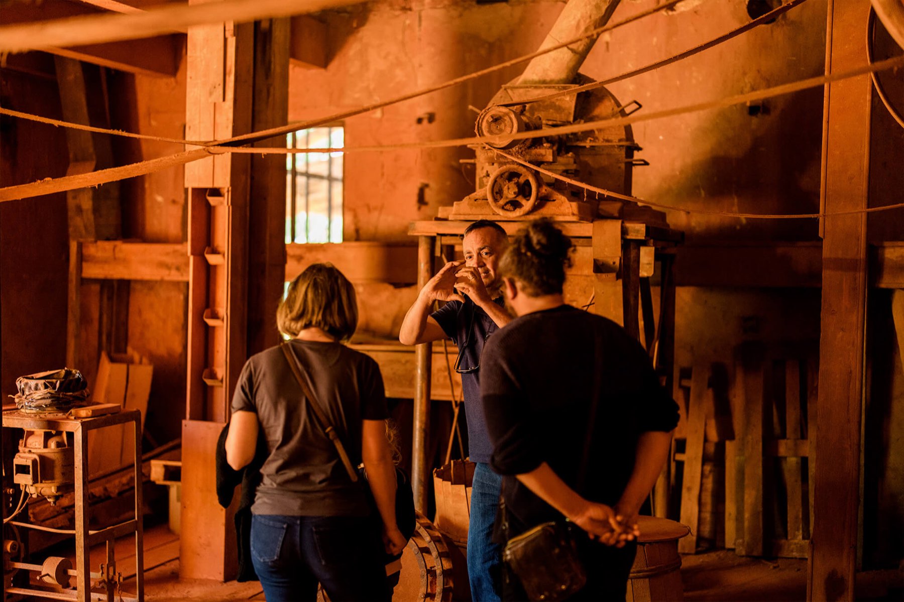 Guided visit inside the former ochre factory machinery, Okhra ecomuseum